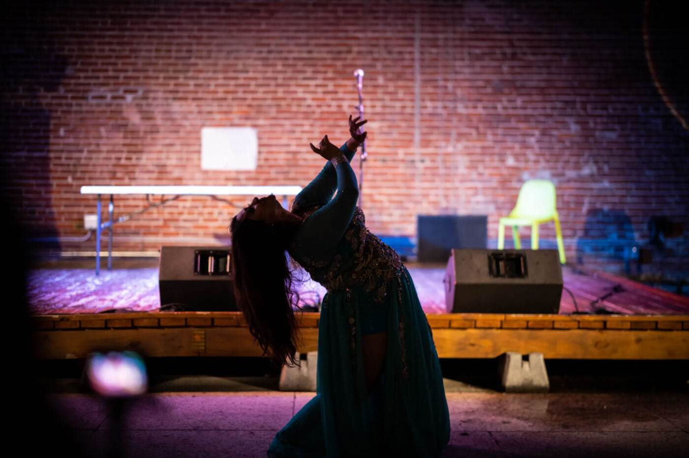 Two people with neon body paint performing on stage - Free Photo